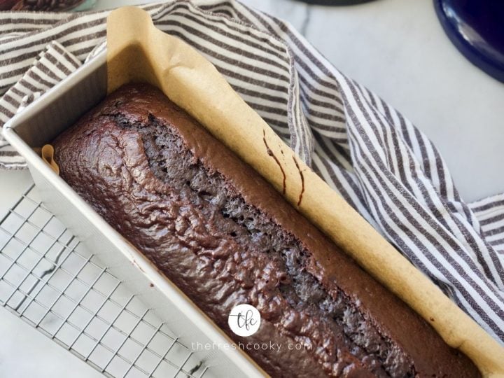 Easy Chocolate Loaf Cake on wire cooling rack out of the oven