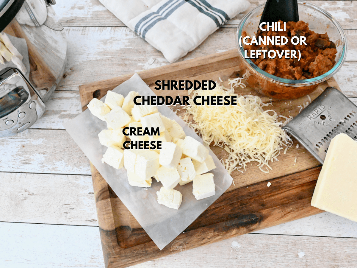 https://www.thefreshcooky.com/wp-content/uploads/2023/01/labeled-ingredients-3-ingredient-chili-cheese-dip-crock-pot.png